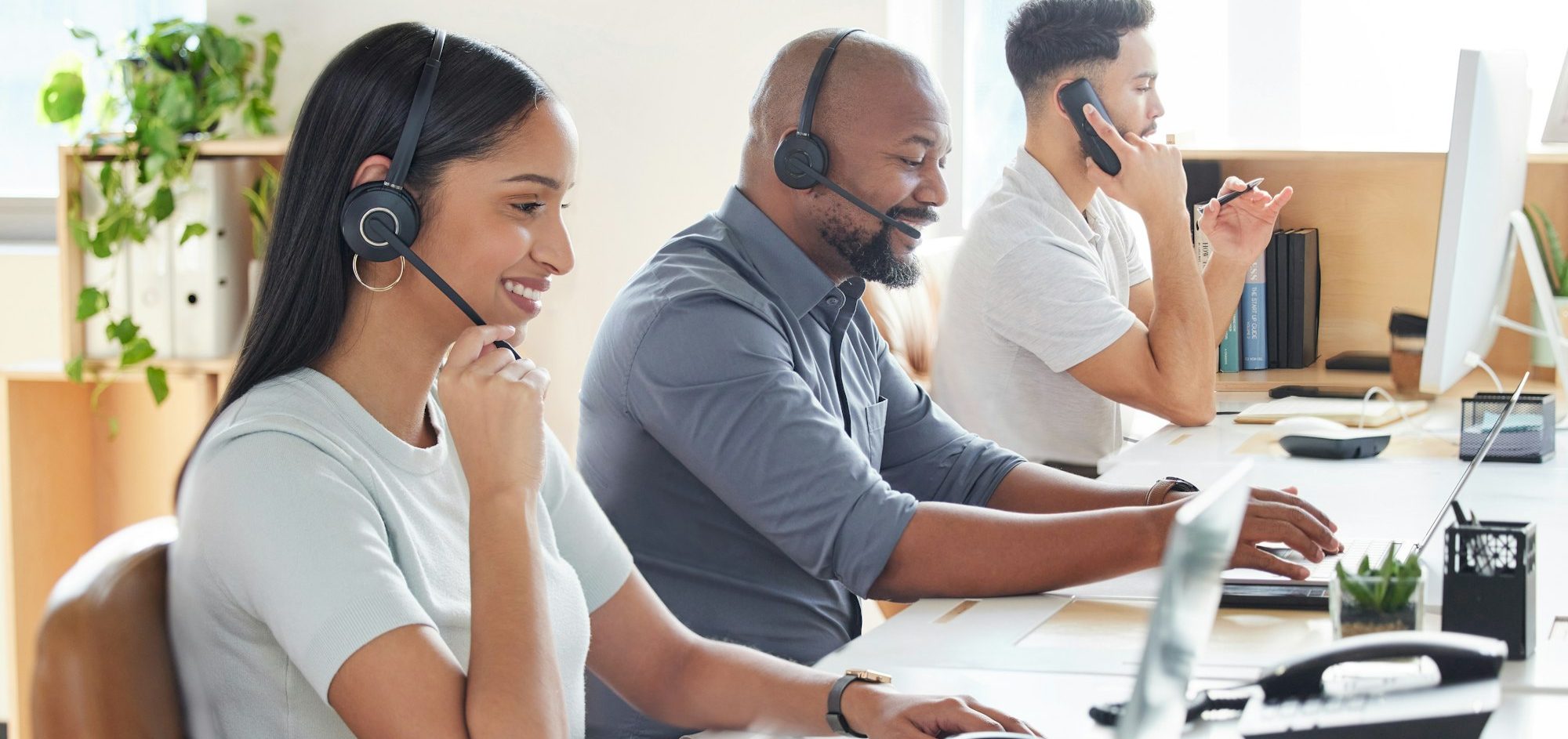 Shot of a group of businesspeople working in a call centre